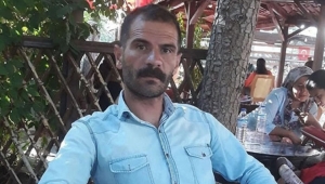Eşini eşarpla boğarak öldürdü