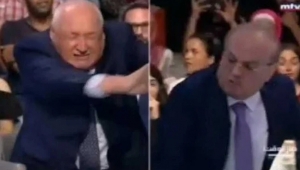 Eski bakan ve gazeteci canlı yayında yumruk yumruğa kavga etti